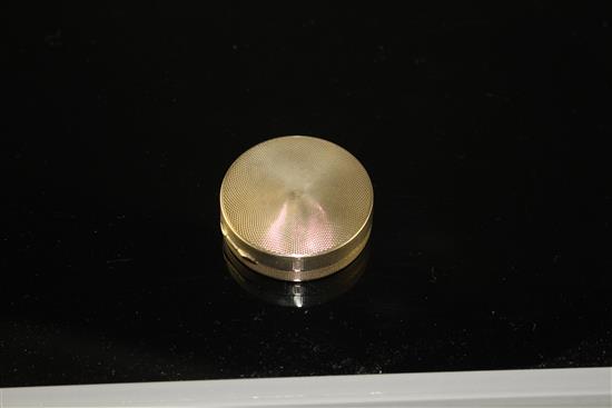 A George V engine turned 9ct gold circular compact, London, 1928, 38mm, gross 21.8 grams.
